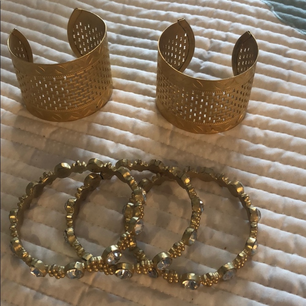 Collection of gold cuffs and bangles
